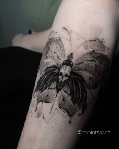 Moth skull tattoo
